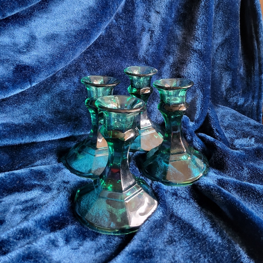Set of 4 vintage candlestick holders. Green glass. $10